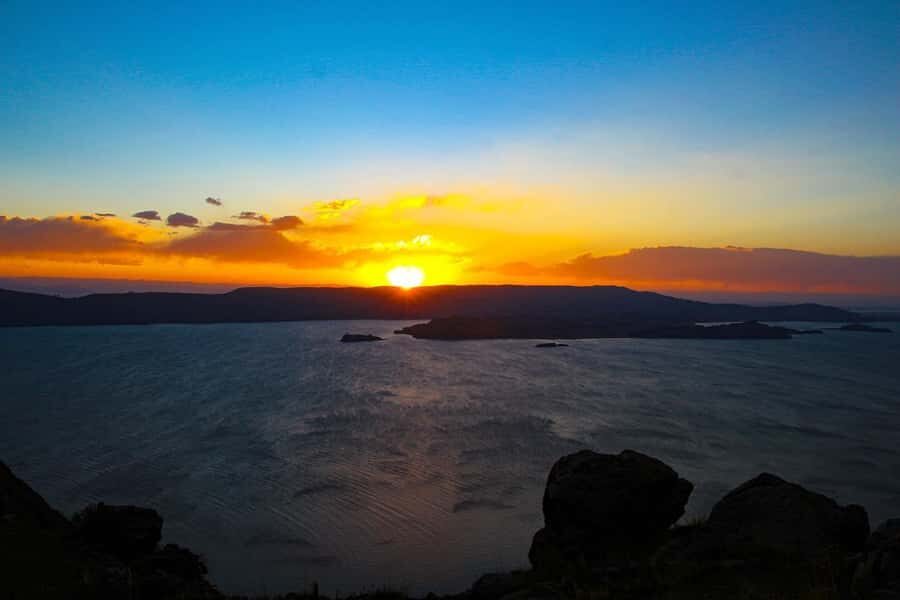 2-Day Amantani Island homestay overnight Tour from Puno - Day 2: Taquile Island Weavers, Market Time, and Trout Lunch