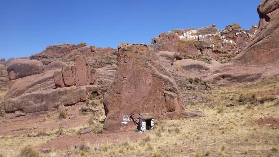 5h tour from Puno to Aramu Muru portal and Inca Ruins - Inca Uyo in Chucuito: fertility stones in an open courtyard