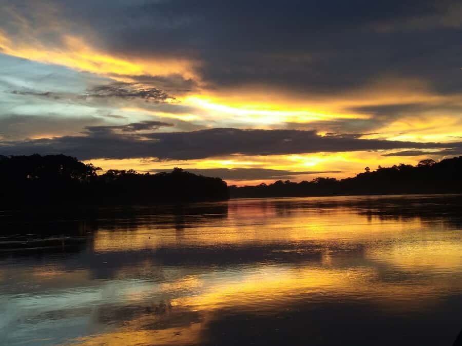 Capibara and caiman search on the Tambopata river - A sunset boat on the Tambopata River: what you’re really paying for