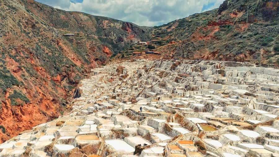 Cusco: Maras Salt Mines & Inca Moray Half Day Trip - Learning local mining techniques—and trying your hand
