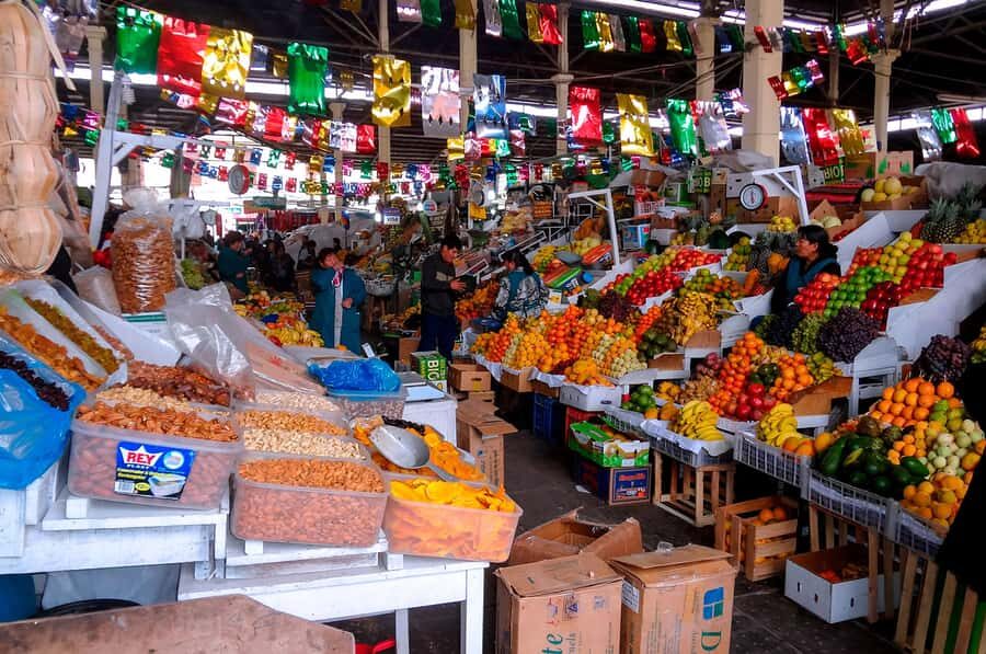 Cusco: Planetarium and Night Tour with Dinner and Pisco Sour - San Pedro Market first: bites, Andean herbs, and an easy way to start Cusco at night