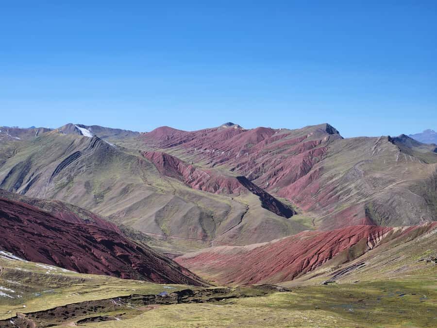 From Cusco: Palcoyo Rainbow Mountain Guided Tour - Main Viewpoint: Ausangante’s Big Reveal from the Platform