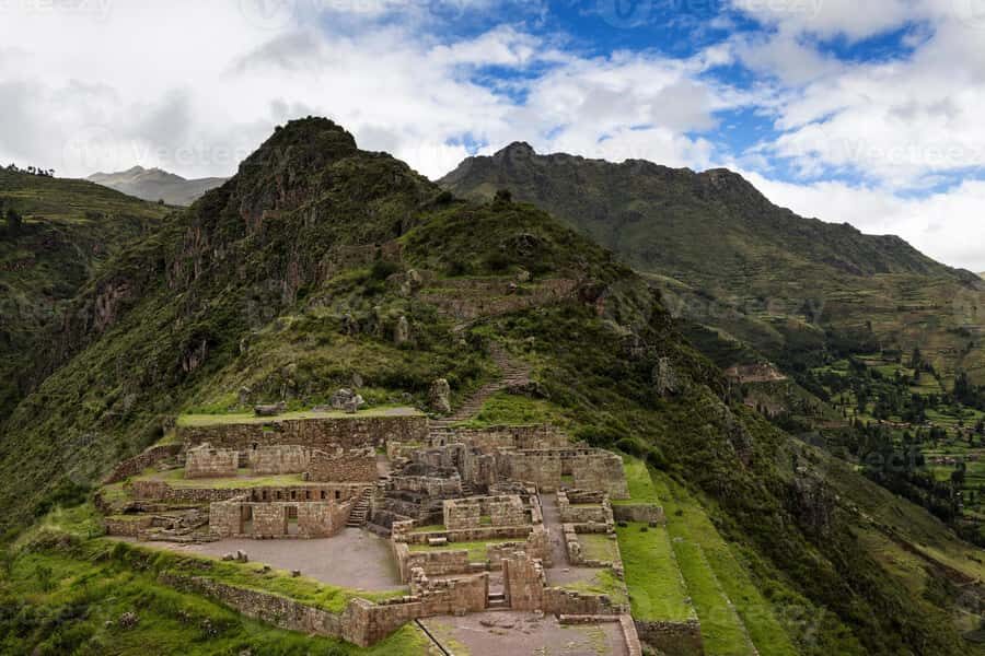 From Cusco: Private Pisac Ruins and Alpaca Farm Day Trip - Entering Pisac Archaeological Park with your guide
