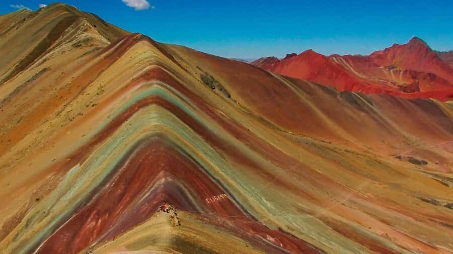 From Cusco: Rainbow Mountain Trek - Trekking Toward Ausangate: Alpacas, Llama Herds, and Red Mountain Views