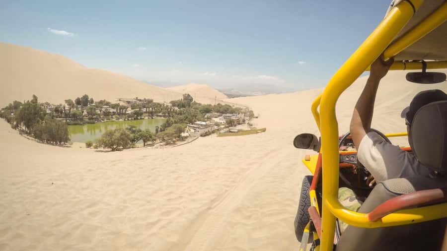 From Lima: Ballestas Islands, Huacachina and Wine Route Trip - Huacachina Oasis by Buggy and Sandboarding
