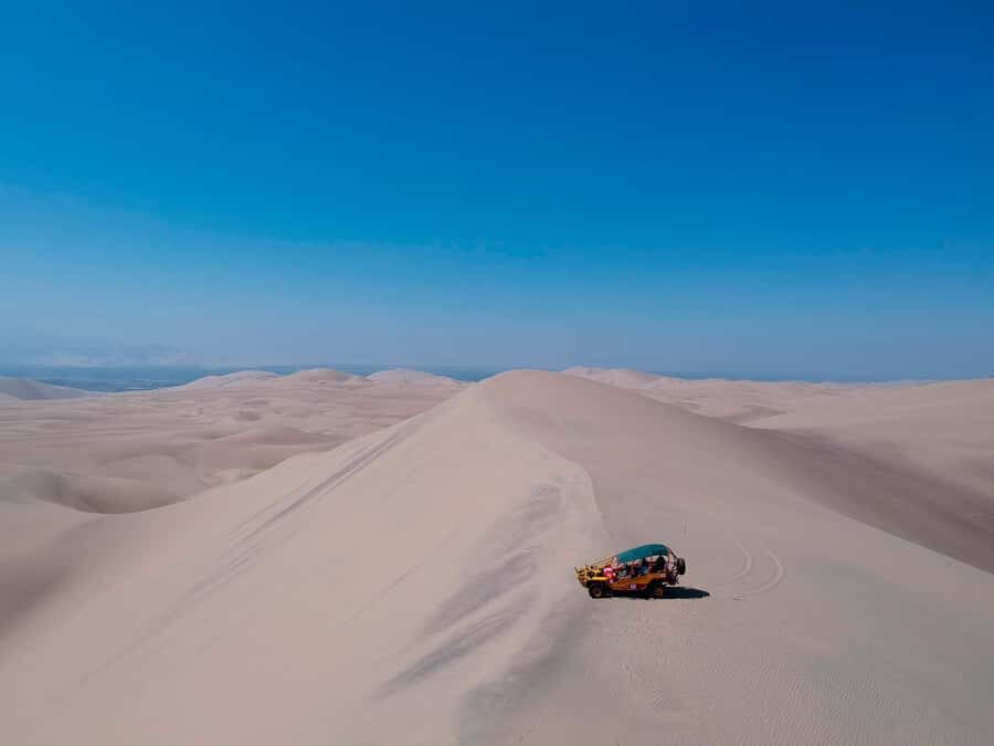 From Lima: Paracas and Huacachina Day Trip with Buggy Ride - Huacachina Oasis Free Time: Swim, Walk, and Plan Your Dunes