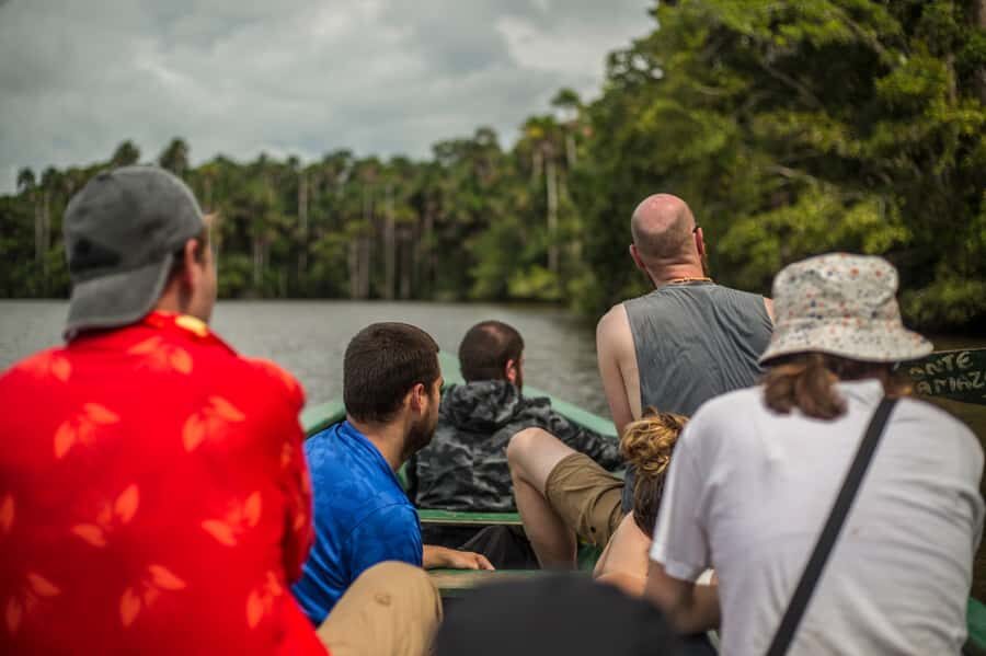 From Puerto Maldonado: Tambopata National Reserve 3-Day Tour - Day 1 at the jungle lodge: Monkey Island and a dusk caiman safari
