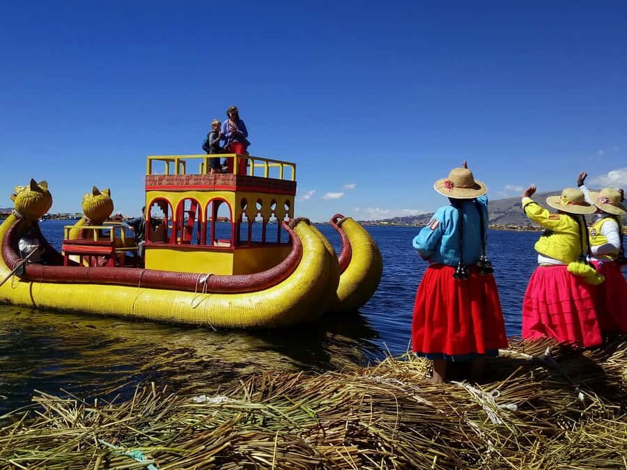 From Puno: Floating Islands of the Uros Half-Day Tour - Reef Boat Ride: Costs, Etiquette, and When It’s Worth It