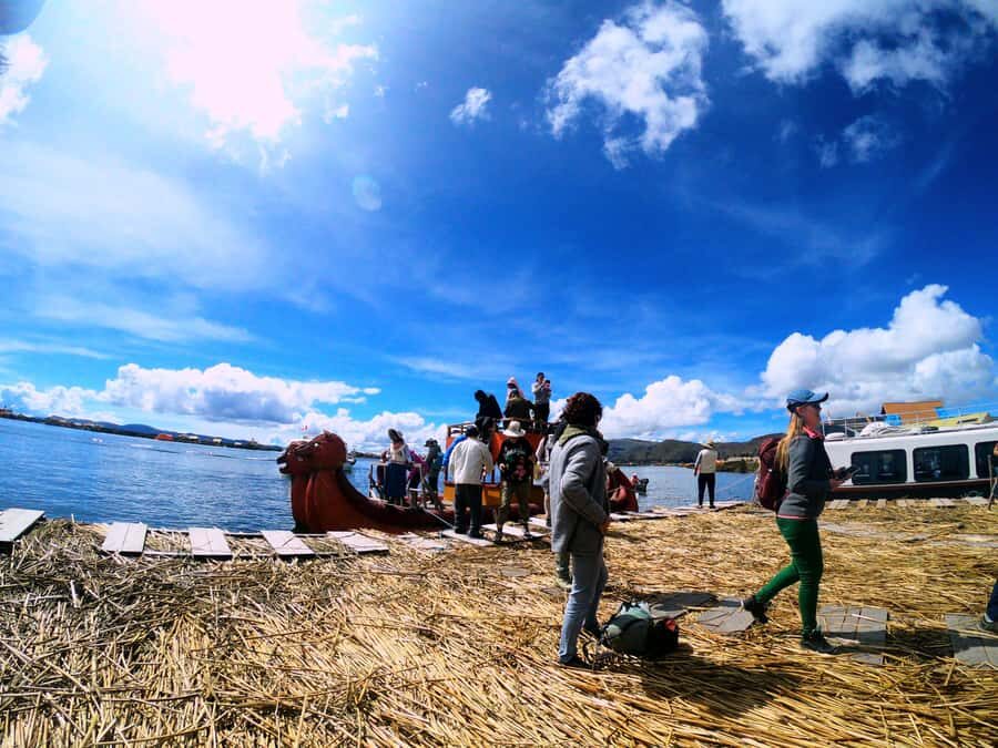 From Puno: Uros floating islands half Day tour - From Puno hotels to the port: what “included” really means