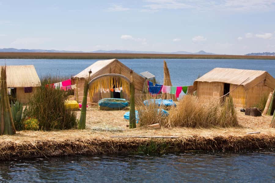 Half Day Guided Lake Titicaca Tour to Uros Floating Islands - The Guided Uros Island Visit: Reed Construction Explained Without Being Too Much