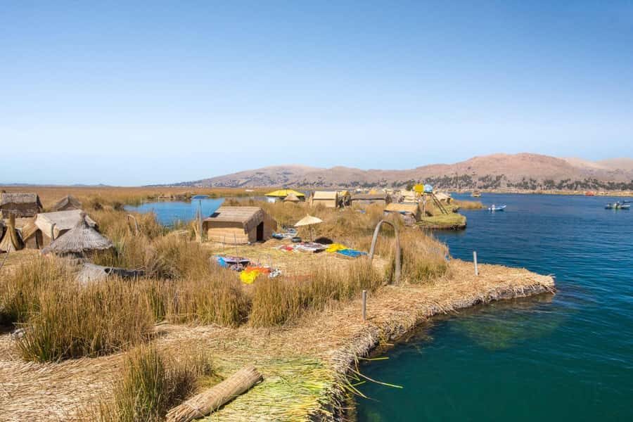 Half-Day Uros Floating Islands Tour from Puno - Getting to Uros: Puno Pickup and the Start of Your Boat Ride