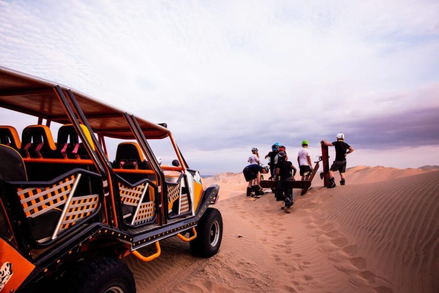 Huacachina: Dune Buggy & Sandboard | Huacachina Oasis | Ica - Sandboarding: Included Gear, Wax, and the Difference Between Sitting and Standing
