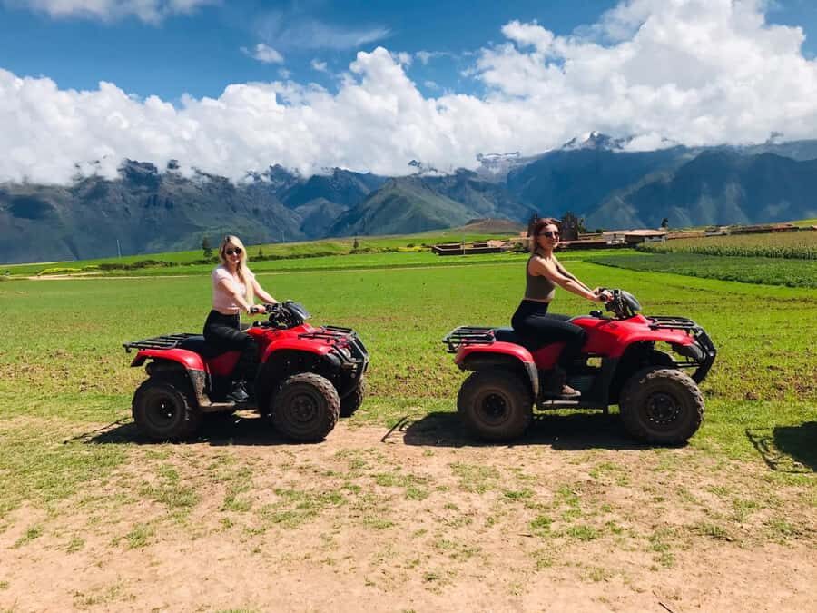 Maras and Huaypo lagoon by ATV from Cuzco | Local Operator - Laguna Huaypo: the water-and-peaks payoff after the ride