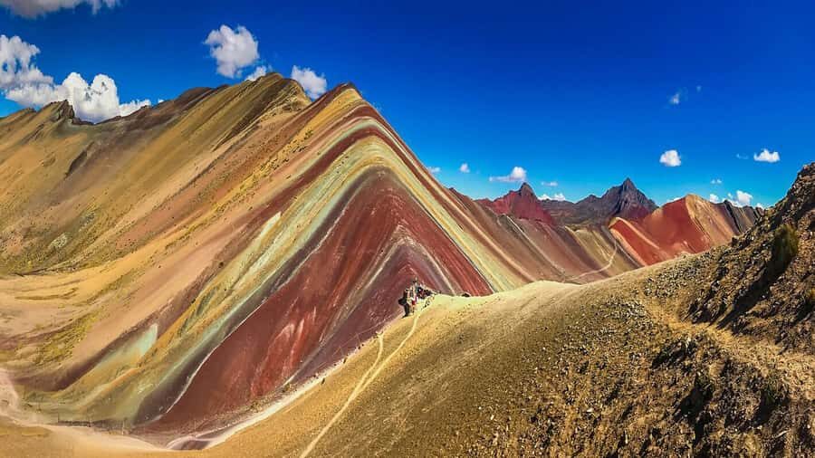 Rainbow Mountain tour and Machu Picchu tour by train - Bus up to the ruins: entrance check and guide start
