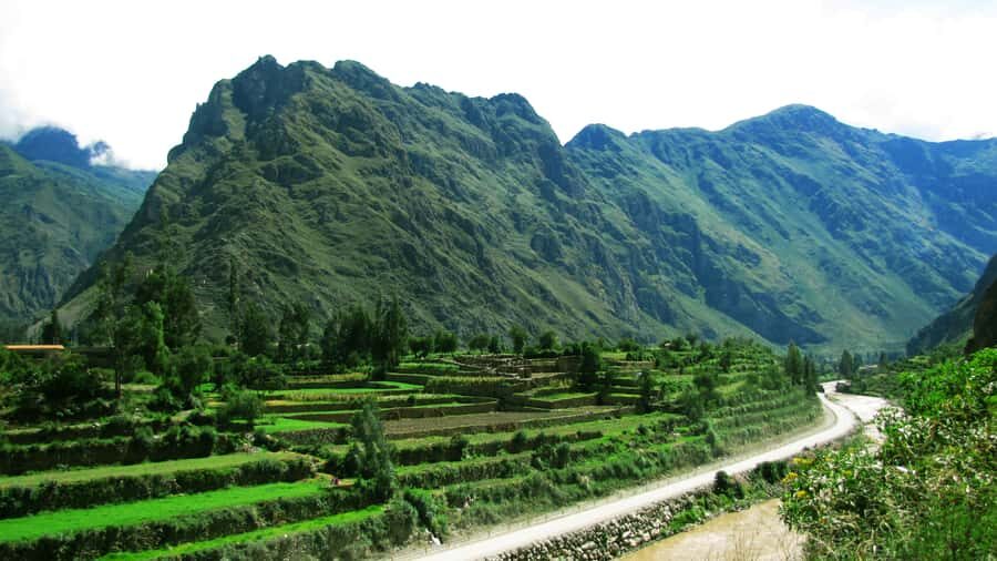 Sacred Valley & Machu Picchu by Train: 2-Day, 1-Night Tour - Pisac ruins and Pisac Market: terraces plus smart souvenir time